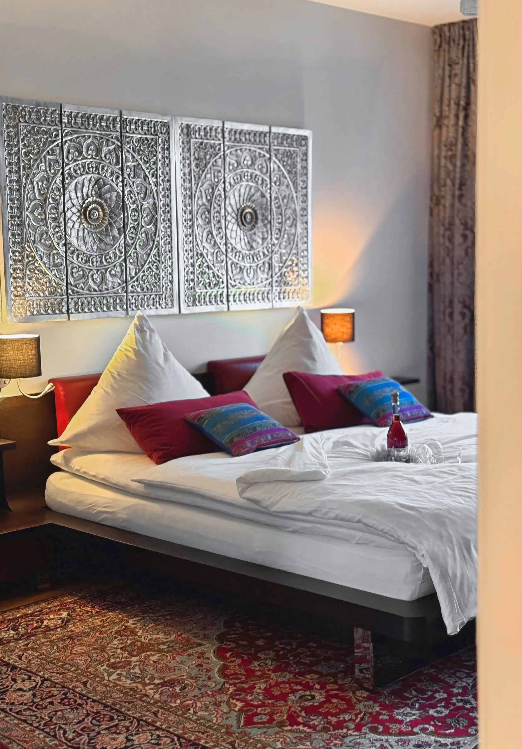 Weiteres Schlafzimmer Apartment 2 mit Doppelbett und Willkommensflasche